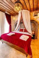 Postel nebo postele na pokoji v ubytování Alika Castle House