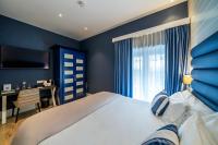Postel nebo postele na pokoji v ubytování Abba San Sebastián Hotel