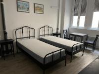 A bed or beds in a room at IM Apartments - Appartamento in zona Piazza Repubblica - Centrale