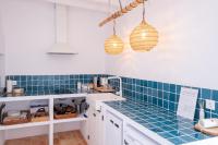 Kuchyň nebo kuchyňský kout v ubytování Precioso Apartamento Boutique El Amante