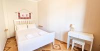 A bed or beds in a room at Kyano seaview