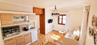 A kitchen or kitchenette at Kyano seaview