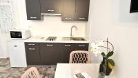 Kuchyňa alebo kuchynka v ubytovaní Apartments Brajde