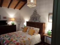 Uma cama ou camas num quarto em Quinta dos Trevos - Artes e Ofícios