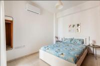 Postel nebo postele na pokoji v ubytování Top Floor Apartment City Center