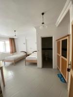 Postel nebo postele na pokoji v ubytování AY OTEL 2