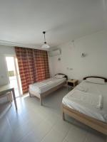 Postel nebo postele na pokoji v ubytování AY OTEL 2