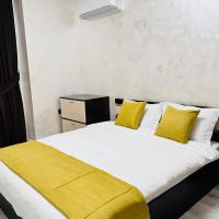 Postel nebo postele na pokoji v ubytování Premium Suites