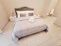 Ruins de charme B&B luxury Pompeiにあるベッド