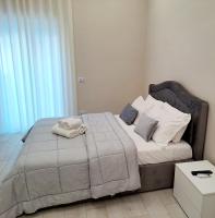 Ruins de charme B&B luxury Pompeiにあるベッド