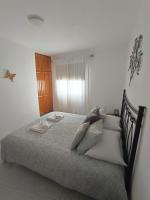Postel nebo postele na pokoji v ubytování Cheyma Home 2ºA, Luminoso apartamento en Alcalá