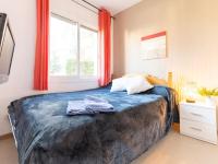 A bed or beds in a room at Apartment Marisa by Interhome