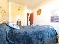 A bed or beds in a room at Apartment Marisa by Interhome