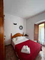 Postel nebo postele na pokoji v ubytování APARTAMENT CAN MINGU 1er pis