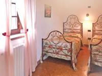 Posteľ alebo postele v izbe v ubytovaní Holiday Home Al Vento by Interhome
