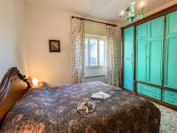 A bed or beds in a room at Apartment Letizia by Interhome