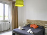A bed or beds in a room at Holiday Home Barbara by Interhome