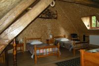 Łóżko lub łóżka w pokoju w obiekcie Gîte Onze