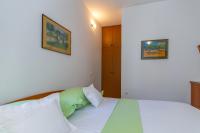 Postel nebo postele na pokoji v ubytování City Center ANA Apartments