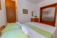 Postel nebo postele na pokoji v ubytování City Center ANA Apartments