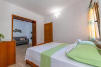 Postel nebo postele na pokoji v ubytování City Center ANA Apartments