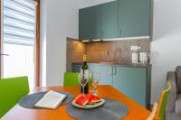 Kuchyň nebo kuchyňský kout v ubytování City Center ANA Apartments