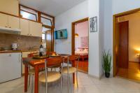 Kuchyň nebo kuchyňský kout v ubytování City Center ANA Apartments