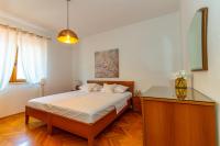 Postel nebo postele na pokoji v ubytování City Center ANA Apartments