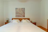 Postel nebo postele na pokoji v ubytování City Center ANA Apartments