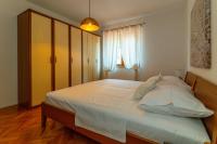 Postel nebo postele na pokoji v ubytování City Center ANA Apartments