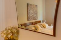 Postel nebo postele na pokoji v ubytování City Center ANA Apartments