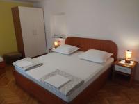 Posteľ alebo postele v izbe v ubytovaní Guest House Damir