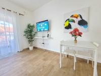 TV a/nebo společenská místnost v ubytování El Dorado Apartment 1bedroom walking distance from Playa Bavaro