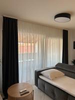 Postel nebo postele na pokoji v ubytování Apartman Rosa