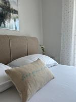 Postel nebo postele na pokoji v ubytování Apartman Rosa