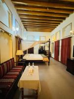 Ein Bett oder Betten in einem Zimmer der Unterkunft Heritage Home Guest House