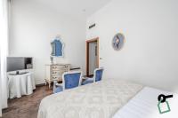 HOTIDAY Room Collection - Venezia Santa Luciaにあるベッド