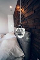 A bed or beds in a room at Pension Baumgartner-Berghof
