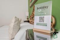 HOTIDAY Room Collection - Venezia Santa Luciaに飾ってある許可証、賞状、看板またはその他の書類