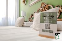HOTIDAY Room Collection - Venezia Santa Luciaにあるベッド