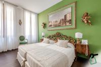 HOTIDAY Room Collection - Venezia Santa Luciaにあるベッド