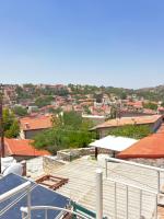 Nespecifikovaný výhled na destinaci Lofou nebo výhled na město při pohledu z apartmánu