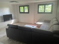 Część wypoczynkowa w obiekcie Luxusný apartmán s bezplatným parkovaním v objekte a self-checking