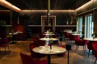 Un restaurant u otro lugar para comer en Araba Fenice Hotel