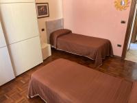 Posteľ alebo postele v izbe v ubytovaní Appartamento Forte Malatesta