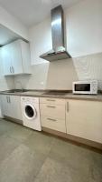Kuchyňa alebo kuchynka v ubytovaní Apartamentos Pintor Losada