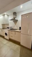Kuchyňa alebo kuchynka v ubytovaní Apartamentos Pintor Losada