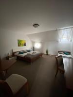 Postel nebo postele na pokoji v ubytování Pivovarský Hotel