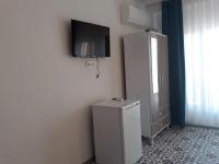 A television and/or entertainment centre at ada kekiği pansiyon