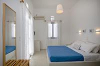 Postel nebo postele na pokoji v ubytování Aster house Agios Sostis